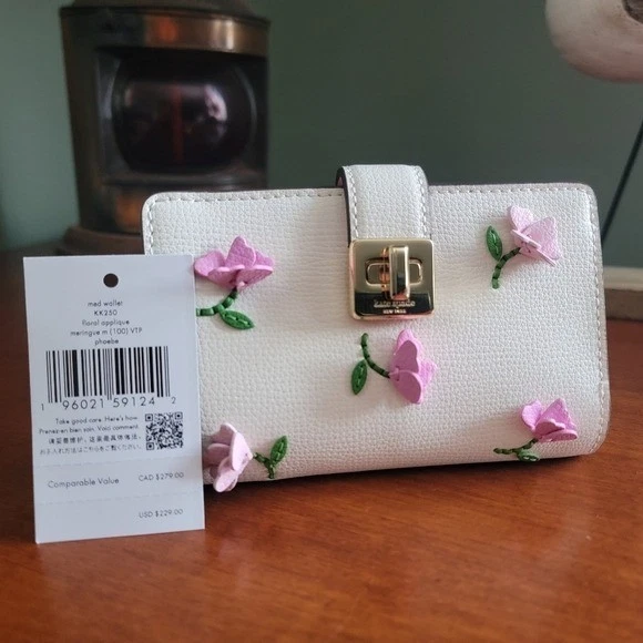 NUEVO CON ETIQUETAS Cartera mediana Phoebe rosa con apliques florales Turnlock cuero blanco #KK250 Foto 1 de 4