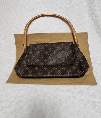LOUIS VUITTON（LV） BORSA A MANO USATA AUTENTICA LOUIS VUITTONS IN OTTIME CONDIZIONI BORSA SPORCA INCLUSA.