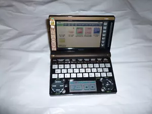 CASIO E-E800 CHINESE - ENGLISH- GERMAN- FRENCH ELECTRONIC DICTIONARY - Picture 1 of 6