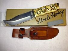 schrade uncle henry fixed blade knife with leather sheath and sharpening stone