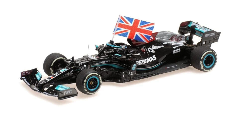 Minichamps 1:43 MERCEDES W12 LEWIS HAMILTON WINNER BRITISH GP 2021 CON BANDIERA - Immagine 1 di 1