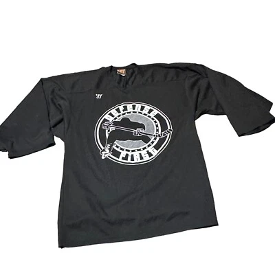 Camiseta deportiva de hockey sobre hielo negra pequeña Warrior Defense de colección para primer adulto Foto 1 de 4