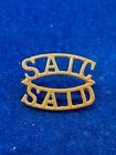 SOUTH AFRICAN INSTRUCTIONAL CORPS SHOULDER TITLE BADGE IN BRASS ON LUGS GENUINE
