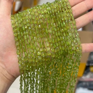 Cuentas de peridoto verde facetadas ovaladas planas transparentes naturales genuinas de alta calidad - Imagen 1 de 6
