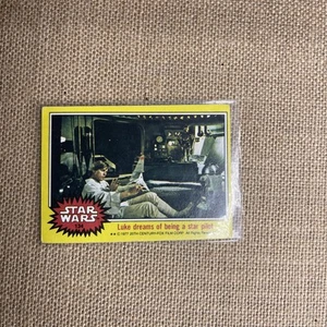 1977 Star Wars #134 Trading Card Luke Sogna di essere un pilota stellare - Foto 1 di 2