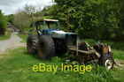 Photo 6x4 Tractor and circular saw Tractor and large circular saw in Ruar c2009