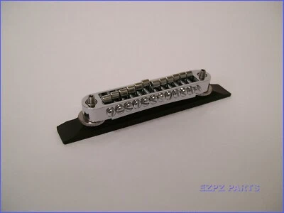 TuneOmatic de 12 cuerdas cromadas con sillines individuales + base plana de madera PIEZAS EZPZ Foto 1 de 4