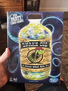 Snake Oil Spiel Familie Spaß Party Kartenspiel Fantasy Szene Hasbro Spiel NEU VERSIEGELT - Bild 1 von 3