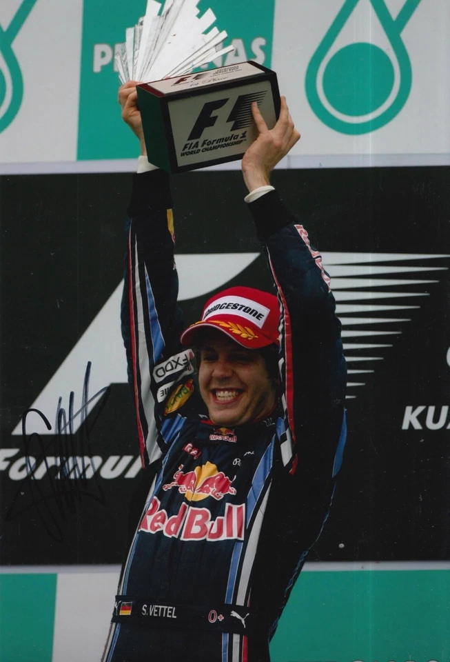 Sebastian Vettel Hand Signed Red Bull F1 12x8 Photo 1. - Image 1 of 1