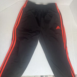 Pantalones de chándal Adidas para niños jóvenes talla grande 14/16 negro y naranja - Imagen 1 de 12