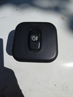 2000-2005 Mitsubishi eclipse LH fog light button switch black insert panel  - Image 1 of 2