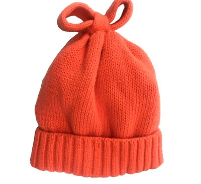 Gorro tejido de algodón naranja con moño Baby Gap para niñas talla 0-6 meses Foto 1 de 4