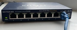 Netgear ProSafe FS108 V2 8-Port 10/100 Fast Ethernet Switch - Charger & Cable - Picture 1 of 7