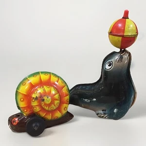 1950s Lehmann AHA 910 NOLI 915 Tin Litho Friction Toy Seal Ball Snail W. Germany - Picture 1 of 6