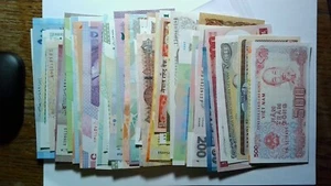Lote de 70 billetes UNC diferentes de todo el mundo - Imagen 1 de 1