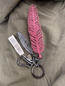COACH DAHILA RUST COLOR FEATHER AND METAL FEATHER KEY RING.*******NWT*** - Picture 1 of 3
