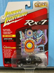 1/64 JOHNNY LIGHTNING CLÁSICO DORADO 1981 MAZDA RX-7 NEGRO BRILLANTE - Imagen 1 de 2