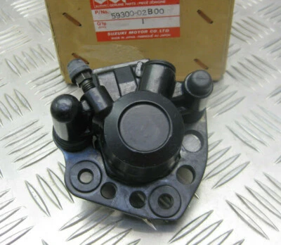 SUZUKI RM80 1986-1988, NEW ORIGINAL FRONT BRAKE CALIPER ASSY, 59300-02B00 - Image 1 of 3
