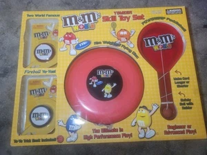 Sehr seltenes M&M's World Yomega Geschicklichkeitsspielzeug Set Yo-yo, Flying Disc, Paddleball - Bild 1 von 6