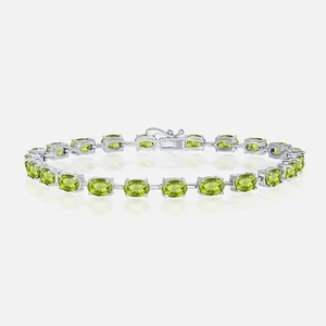 STERLING SILVER OVAL GENUINE PERIDOT TENNIS BRACELET, 7.25" LENGTH, 8 CTTW - Picture 1 of 1