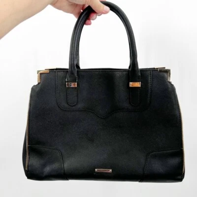 Cartera amorosa Rebecca Minkoff negra dorada defectuosa VER FOTOS Foto 1 de 4