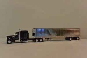 DCP 1/64 Black Kenworth W900L 86" Studio Sleeper & Utility Spread-Axle Reefer - Picture 1 of 17
