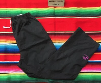 De colección Nike Oregon EE. UU. Negro Cremallera Nylon Calentamiento Pantalón de Pista M Etiqueta Azul Años 80 Foto 1 de 4