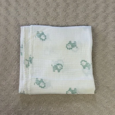 Manta bebé Aden + Anais azul aguamarina verde león muselina blanca delgada Foto 1 de 4