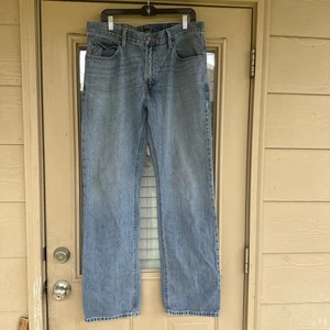 Pantalones de mezclilla Ariat para hombre 34x34 lavado medio M2 corte bota relajado desgastado - Imagen 1 de 22