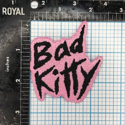 BAD KITTY PINK BLACK TEXT LOGO COMIC NOVELTY BIKER 2.75" IRON ON CLOTH PATCH - Image 1 of 2