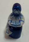 Small Hand Painted Blue & White China figure of a Woman reading, Made in USSR