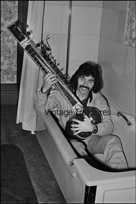 Black Sabbath Guitarist Tony Lommi Playing Sitar in Style Photo Print Poster - Image 1 of 1