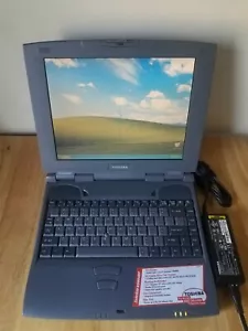 Toshiba Satellite 2595CDT 12.1” TFT(Intel Celeron @ 400MHz,128MB Ram,40GB HDD) - Picture 1 of 12