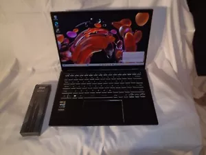 MSI Summit E14FLIPEVO A12MT-O15 14" QHD+FINGER TOUCH PANEL LAPTOP W/INTEL IRIS - Picture 1 of 8