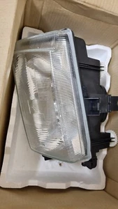 Passenger side headlight VW Caddy & Polo saloon / estate NOS Valeo - Picture 1 of 5