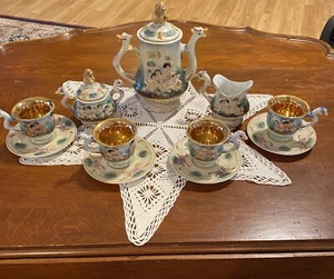 JUEGO DE TÉ DE CAFÉ R. CAPODIMONTE QUERUBÍN LEÓN SERPIENTE DRAGÓN 13 piezas para 4 ORO ITALIA - Imagen 1 de 10