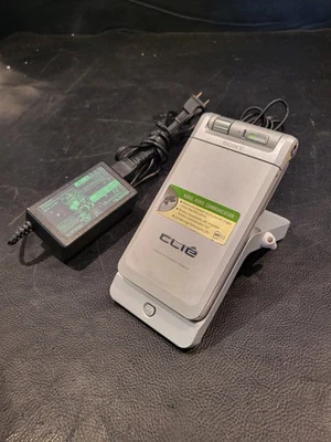 Sony Clie PEG-NR70V/U Personal Palm Size Entertainment Organizer Silver AS-IS - Image 1 of 4