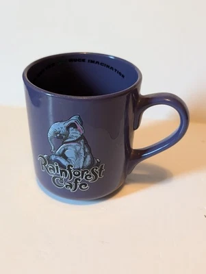 Rainforest Café TUKI MAKEETA Elefante Púrpura 16 OZ. Taza de café de cerámica de colección 2000 Foto 1 de 4