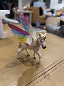 Schleich 70577 Geflügeltes Einhorn Fohlen Figur - Bild 1 von 3