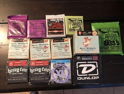 Lote de juegos de cuerdas para guitarra y bajo Foto 1 de 4