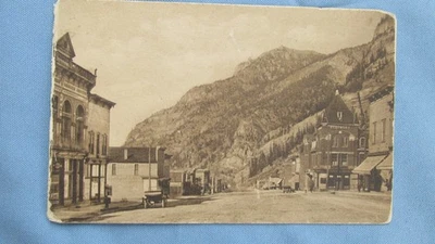 Tarjeta postal con foto real Ouray Colorado Main Street de 1900 - Hotel Beaumont - Ciudad minera Foto 1 de 4