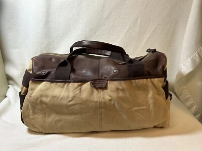 Maleta de viaje grande de cuero y lona Fossil marrón Foto 1 de 4