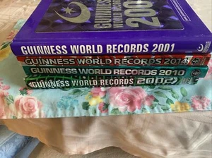 Guinness World Records Books-Lot of 4- great condition - Picture 1 of 3