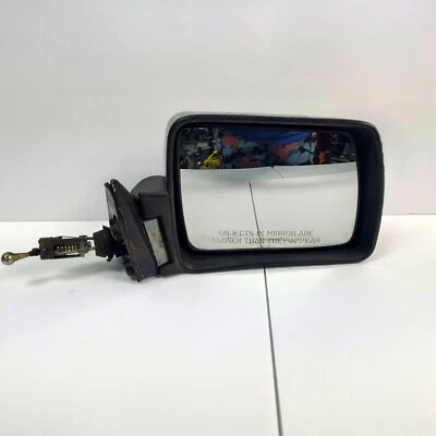 Espejo retrovisor remoto manual derecho lado pasajero Jeep Cherokee XJ 1984-1996 con moldura OEM Foto 1 de 4