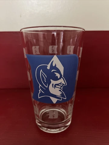 Duke Blue Devils Drinking Glass. 6” Tall Large Logo with Smaller Logos on Glass Cover