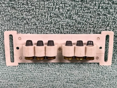 Clip de cinturón de bala pistola tapa 32/38 Nichols Stallion de la década de 1950 vintage con 6 balas de 2 piezas Foto 1 de 4