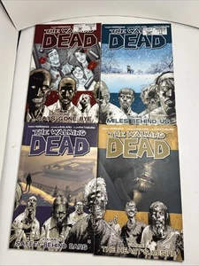 The Walking Dead Volumes 1-4 Kirkman Moore Adlard Horror Graphic Novels - Picture 1 of 6