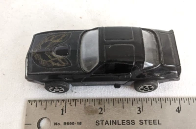 ВИНТАЖНЫЙ 1980-х ЛИТОЙ TRANS-AM FIREBIRD ДЫМЧАТЫЙ БАНДИТ ЧЕРНЫЙ ВЫДВИЖНОЙ ИГРУШКА ТАЙВАНЬ - Изображение 1 из 4