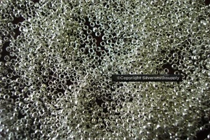 Plata pl latón 1x1,5mm redondo muy pequeño crimpado cuentas lote 500 piezas FPS114 - Imagen 1 de 4