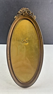 Antiguo caballete victoriano de latón alargado ovalado con marco de fotos flores traseras 8" x 4" Foto 1 de 4